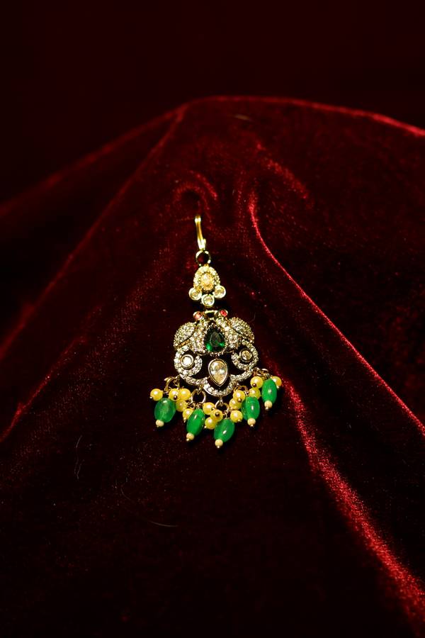 Antique Matte Gold Maang Tikka with Emerald Drops and Seed Pearls