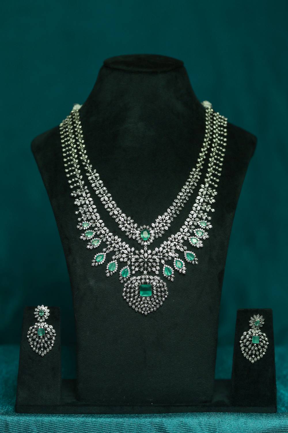 The Emerald Aura Rhodium-Plated American Diamond Two-Layer Statement Necklace Set