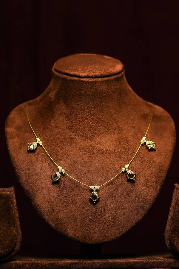  Elegant Invisible Chain Necklace with White Stone Teardrop Pendants