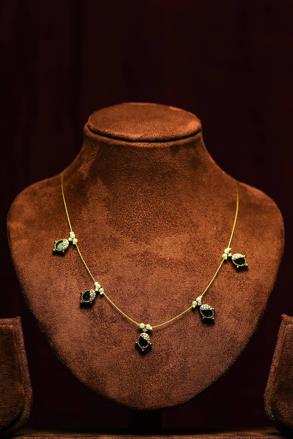 Elegant Invisible Chain Necklace with Purple Teardrop Pendants