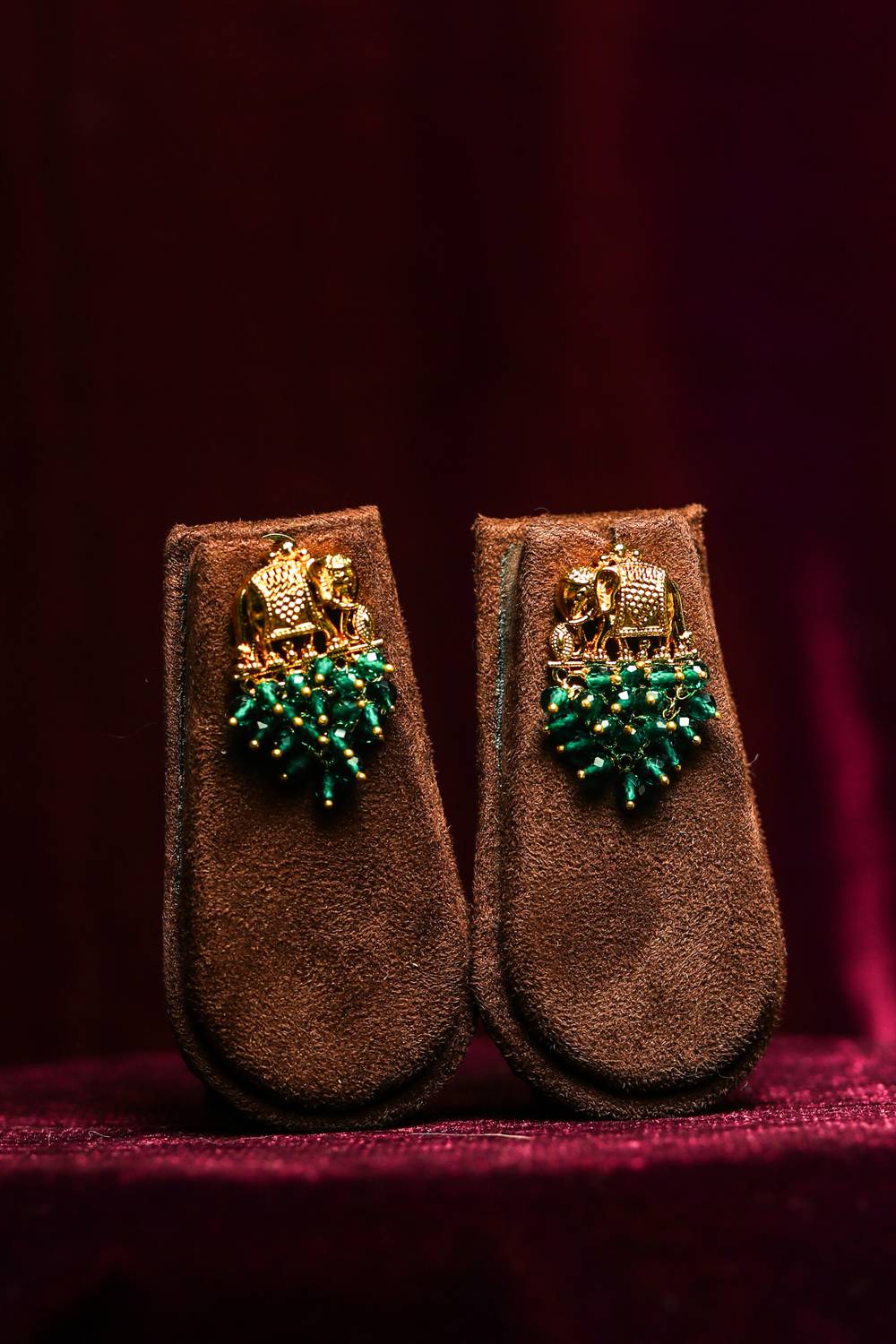 Royal Elephant Motif Gold-Tone Studs with Emerald Bead Clusters