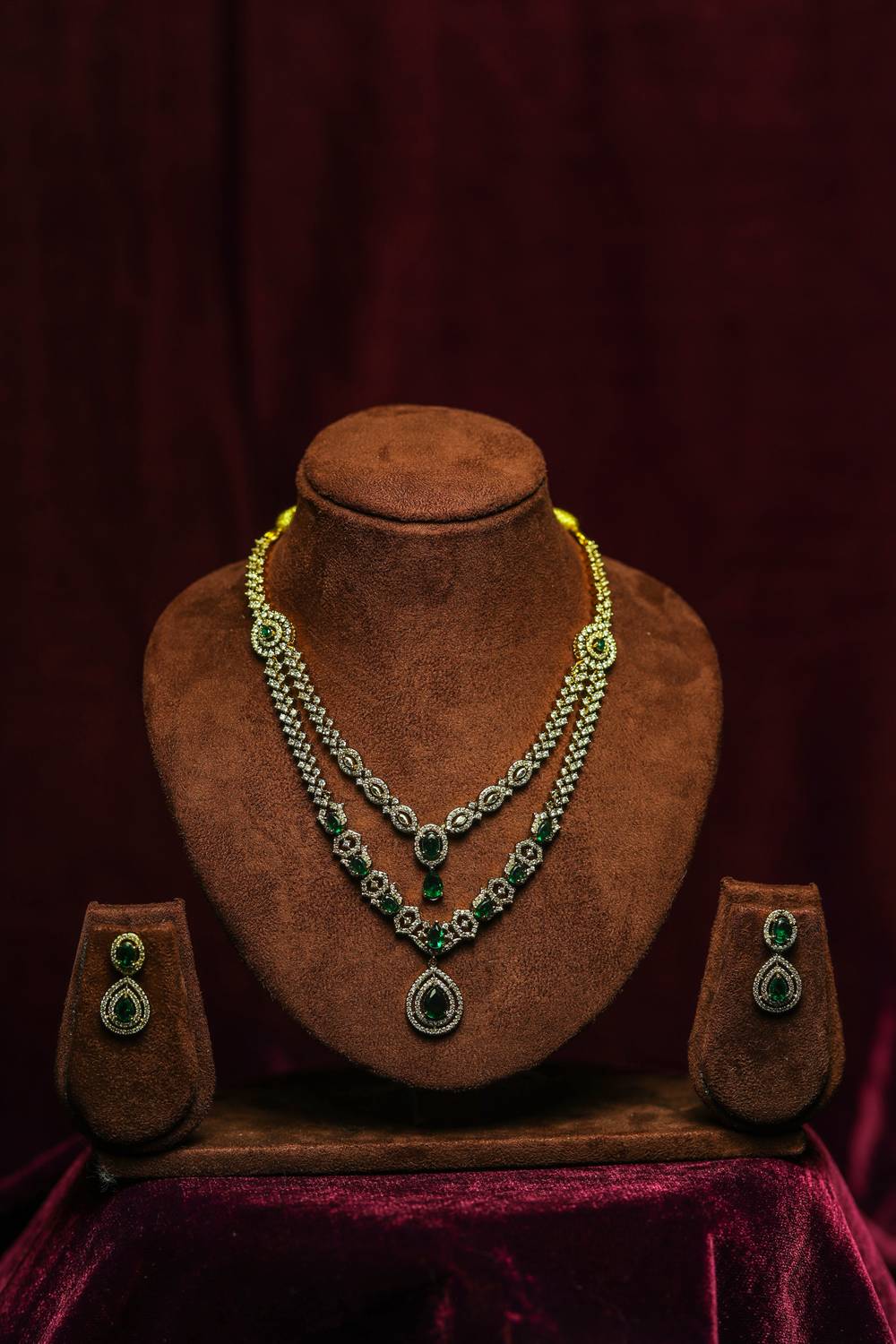 Regal Emerald & American Diamond Layered Necklace Set. egal Emerald & American Diamond Layered Necklace Set.